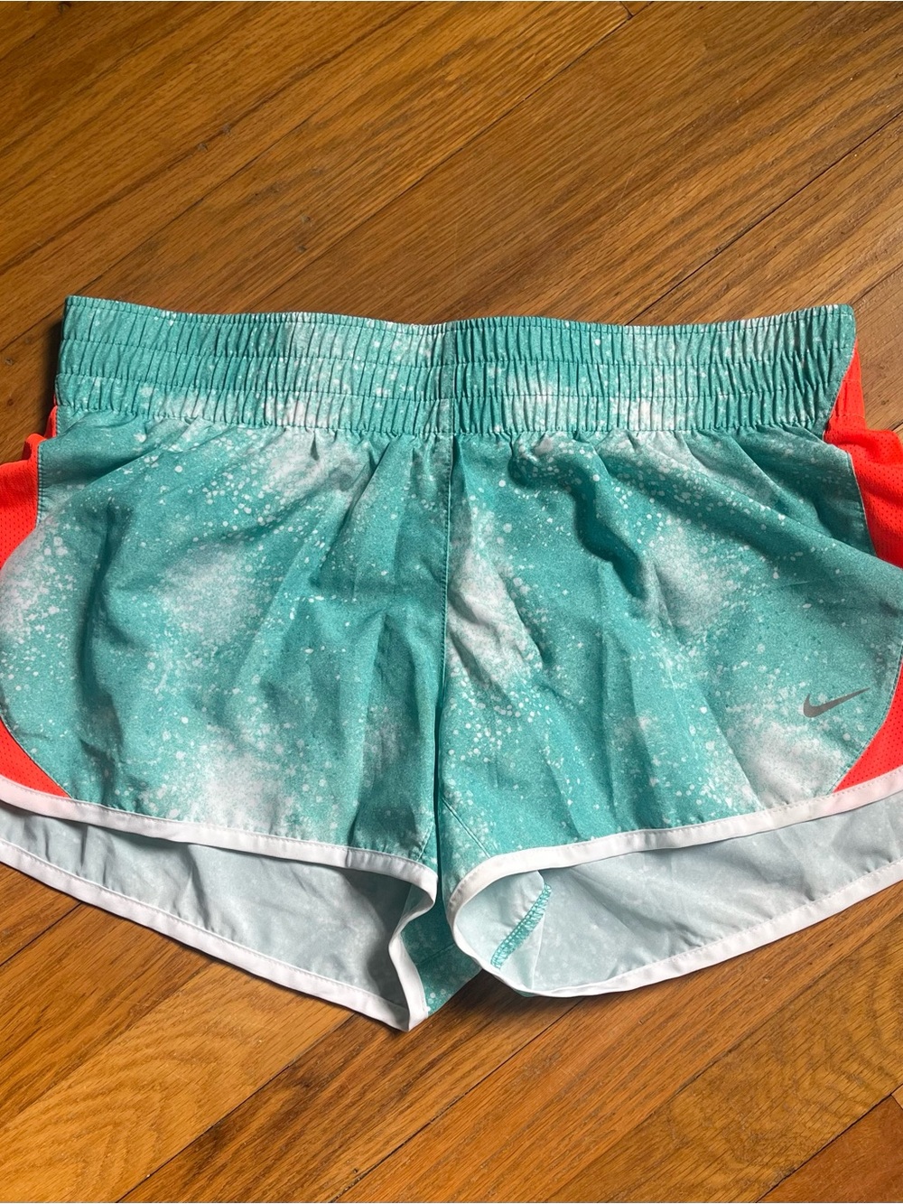 Nike Teal Splatter Running Shorts with Coral Accents